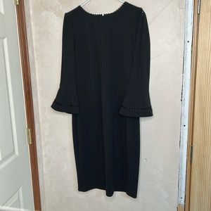 Channel Audrey Hepburn. In this classic black dress.